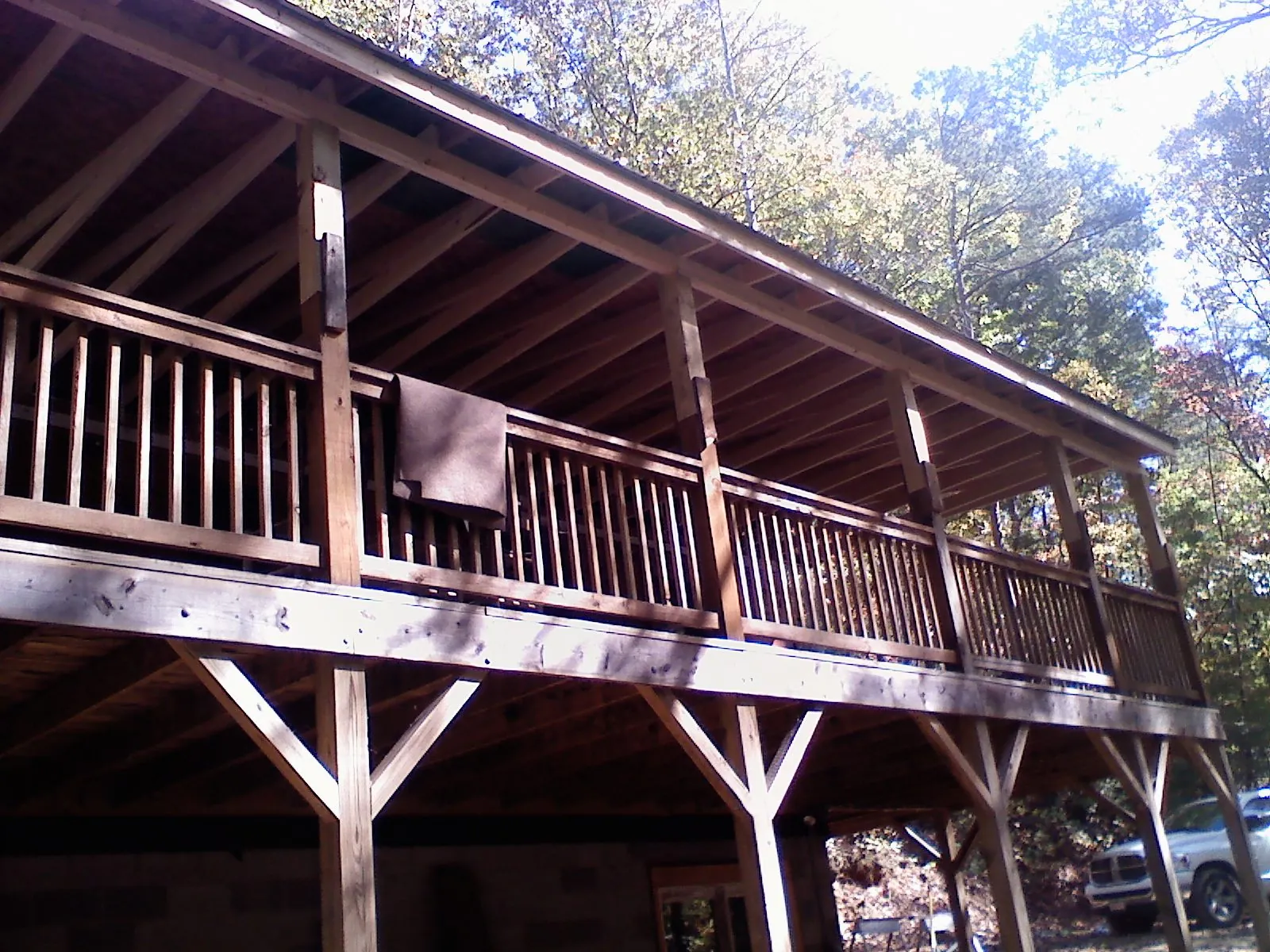 Timber framing under a new elevated porch and deck — Roof Leak Repair in Baker City by Roofing Brothers